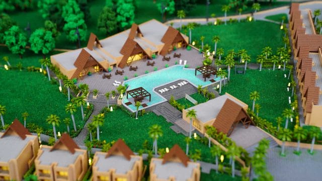 Model of a luxury resort with pools and tropical landscaping in a scenic setting.