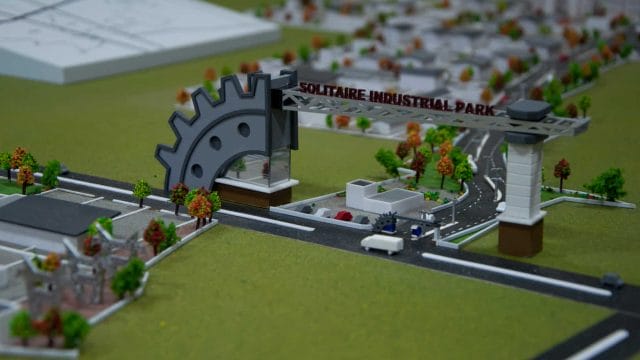 Industrial park model at 72 Solitaire Park by Kgk Realty, detailed miniature layout.