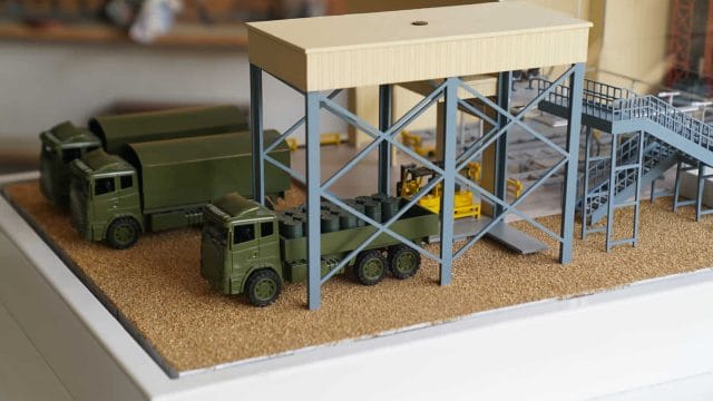 Refinery model with trucks at oil depot in Jaisalmer, Rajasthan.