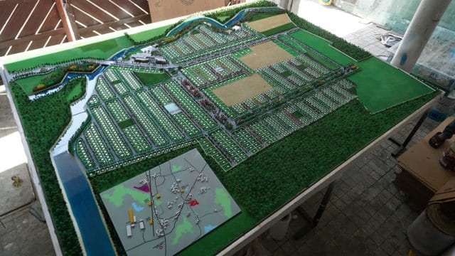 Beige Newt model of 69 Brookside by Lok8 Infra, Nagpur, showcasing detailed residential layout and g.
