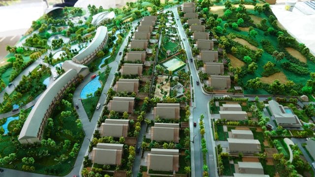 Modern residential development model with greenery and pathways, inspired by 70 Mount Kusur by Clark.