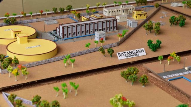 Beige Newt model of Ratangarh town with buildings and landscape features.