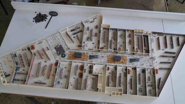 Beige Newt model for 64 GT South City exhibition, detailed layout and miniature city planning.