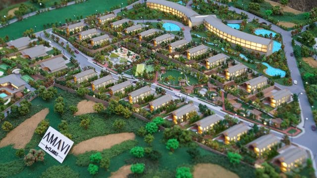 Modern residential community with lush greenery and amenities at Mount Kusur by Clarks.