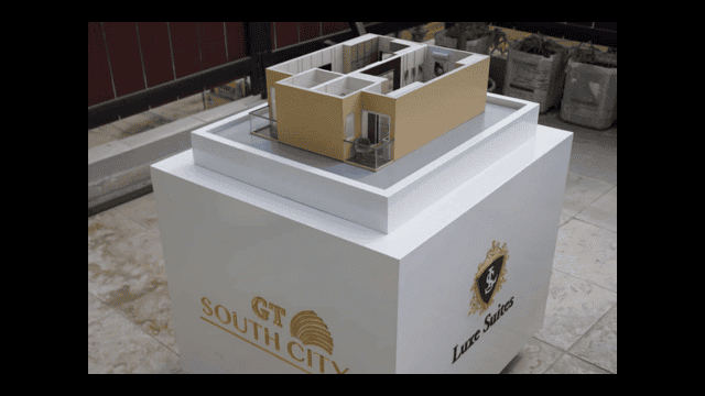 A modern architectural model of the 48 GT South City Luxe Suites development.